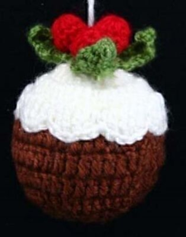 Knitted Christmas Pudding Tree Decoration by Gisela Graham. Hanging Christmas Tree Decorations. Knitted Christmas Pudding Bauble by Gisela Graham. Size 12x7cm<br><br>
If it is Christmas Tree Decorations to be sent anywhere in the UK you are after than look no further than Booker Flowers and Gifts Liverpool UK. Our Tree Decorations are specially selected from across a range of suppliers. This way we can bring you the very best of what is available in Tree Decorations.<br><br>
Here at Booker Flowers and Gifts we love Christmas and as such we have a massive range of traditional and contemporary Christmas Decorations.<br><br>

Gisela loves Christmas Gisela Graham Limited is one of Europes leading giftware design companies. Gisela made her name designing exquisite Christmas and Easter decorations. However she has now turned her creative design skills to designing pretty things for your kitchen, home and garden. She has a massive range of over 4500 products of which Gisela is personally involved in the design and selection of. In their own words Gisela Graham Limited are about marking special occasions and celebrations. Such as Christmas, Easter, Halloween, birthday, Mothers Day, Fathers Day, Valentines Day, Weddings Christenings, Parties, New Babies. All those occasions which make life special are beautifully celebrated by Gisela Graham Limited.<br><br>
Christmas and her love of this occasion is what made her company Gisela Graham Limited come to fruition. Every year she introduces completely new Christmas Collections with Unique Christmas decorations. Gisela Grahams Christmas ranges appeal to all ages and pockets.<br><br>
Gisela Graham Christmas Tee Decorations are second not none a really large collection of very beautiful items she is especially famous for her Fairies and Nativity. If it is really beautiful and charming Christmas Decorations you are looking for think no further than Gisela Graham.<br><br>
This Bauble is in the shape of a Christmas pudding and makes a lovely Christmas Tree Decoration by Gisela Graham. It adds a quirky twist to your Christmas Tree decorations .The knitted design gives a great effect and it is likely to become a favorite Christmas decoration and be enjoyed by many generations. Remember Booker Flowers and Gifts for Gisela Graham Tree Decorations that can be send anywhere in the UK.
